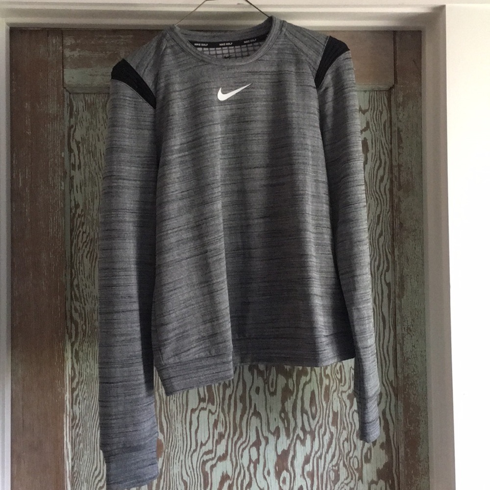 Nike sweater. Longer than crop top.